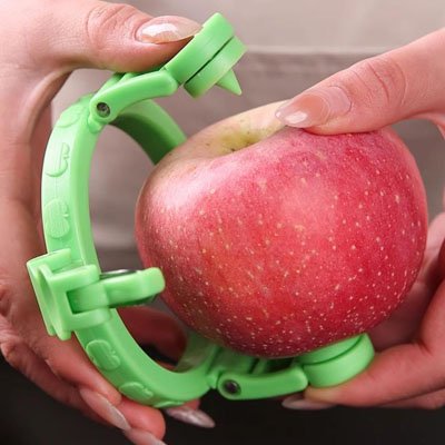 eplucheur a pommes le rotatif manivelle ergonomique douce