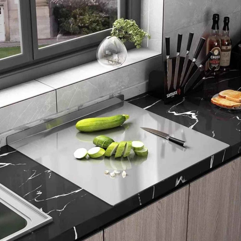 planche a decouper chef dacier trancher la courgette